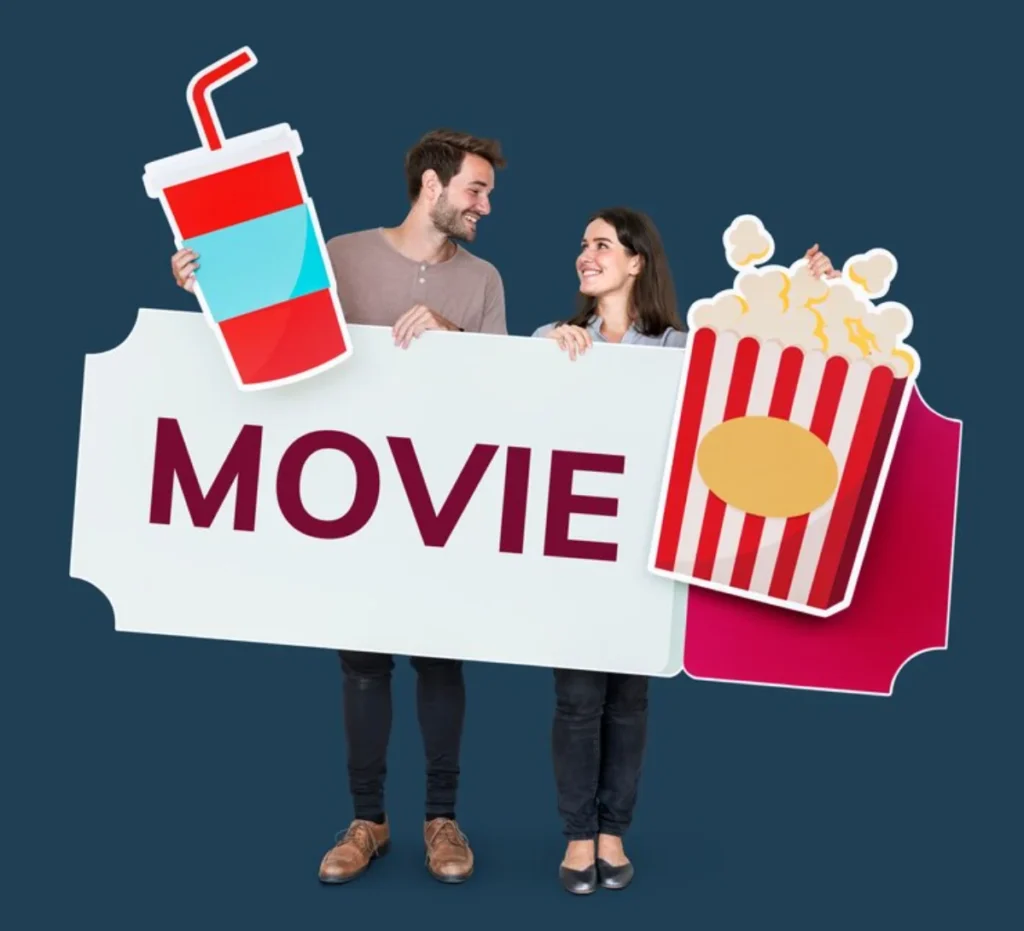 A young man and woman smiling at each other, holding a large sign that reads "MOVIE"